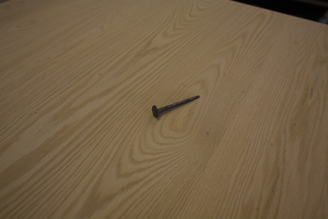 A hand-forged nail like what is in each of the four
    corners to symbolize the four nails with which Christ was crucified.