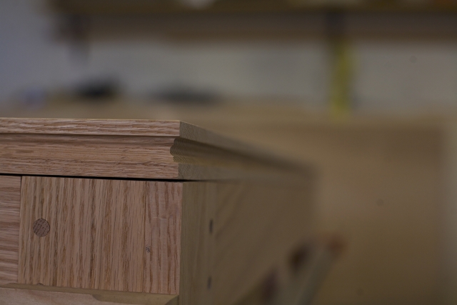 The altar table will be dressed with multiple layers
    of cloth. There is a groove all the way around the edge of the table for a cord to secure the
    bottom layer in place.