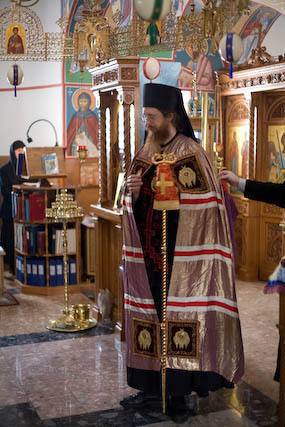 The faithful and the clergy chant “Many Years” to Bishop
          John.