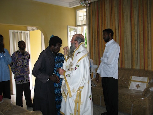 Father Ambrose and his family being Chrismated.