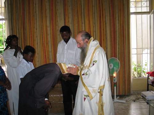 Father Ambrose having “Laying-on-of-hands” and the Prayer of
    Forgiveness.