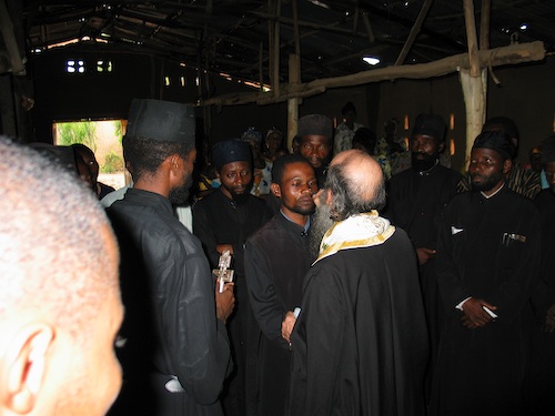 The Clergy Being Chrismated.