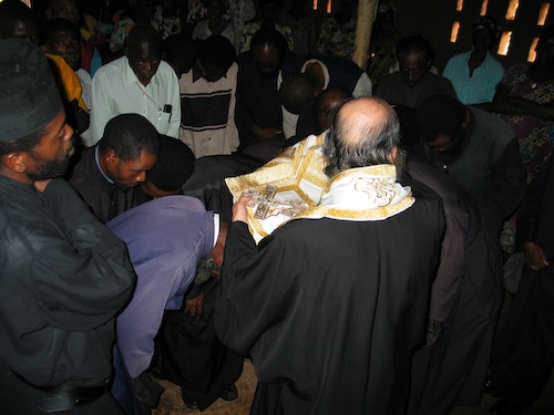 The Clergy having the Prayer of Forgiveness read over them.