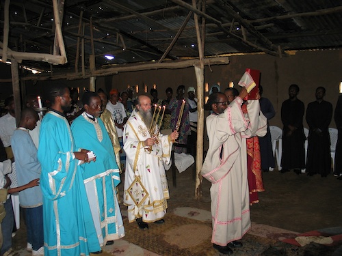 In the Divine Liturgy, the Small Entrance. Deacon Timothy raises the
    Gospel.