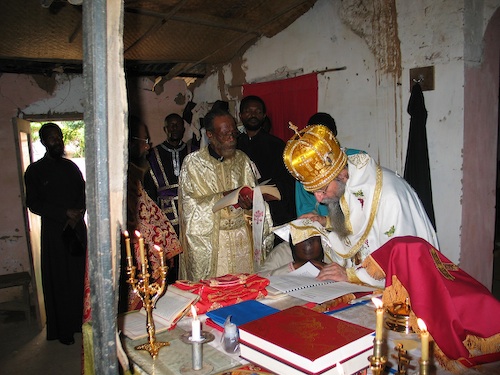 Father Timothy being Ordained a Priest.