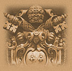 A detail of the current
  official seal of Pope John Paul II, including the triple-tiara symbolizing his supposed three
  kingdoms (heaven, earth, and the underworld) and the keys of the kingdom of heaven, supposedly
  entrusted to the Roman Pontiffs.