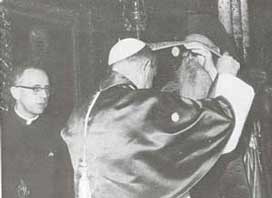 Athenagoras Helps in the
  Vesting of Pope Paul VI With a Gold Orarion (A Gift) During Their Co-Worship.