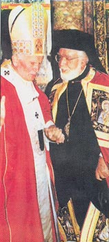Archbishop Iakovos of
  North and South America with Pope John Paul II at their concelebration on November 30, 1992.